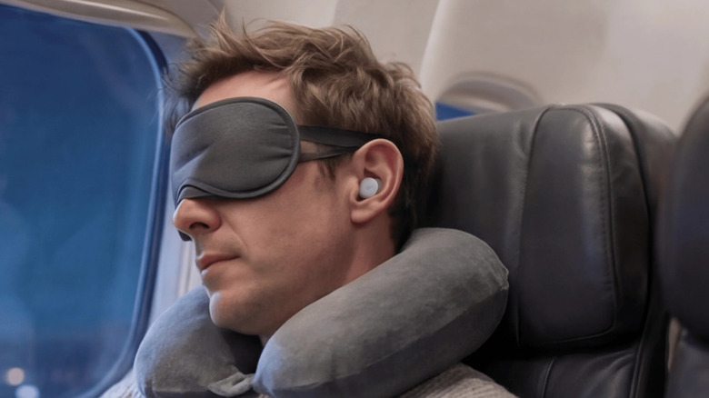 Person wearing soundcore Sleep A30 Special while in a flight