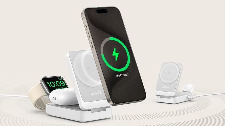 Anker MagGo 3-in-1 Qi2 foldable charging station charging an iPhone, Apple Watch, and AirPods simultaneously.