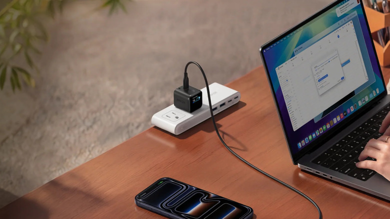 Anker Nano Charger 45W charging phone on office desk with laptop