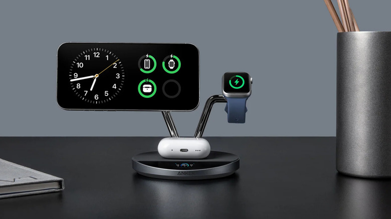 Anker Prime 3-in-1 Wireless Charging Station on office table with iPhone, Apple Watch, and AirPods attached
