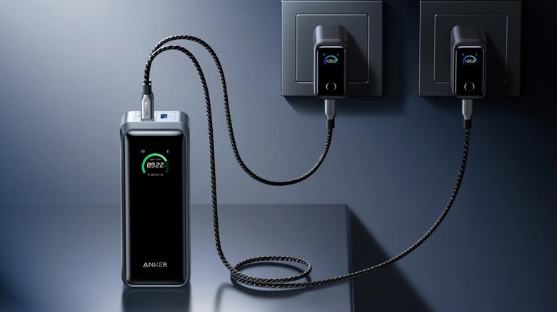 An Anker power bank charging using two Anker chargers