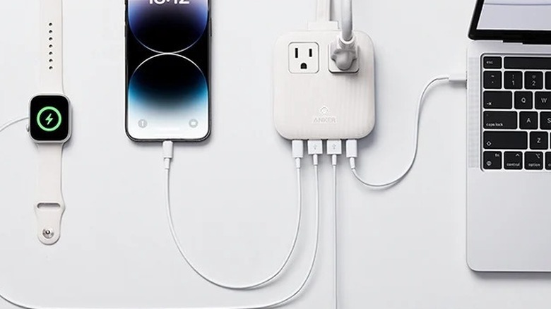 An Anker Nano Charging Station connected to multiple devices on a table