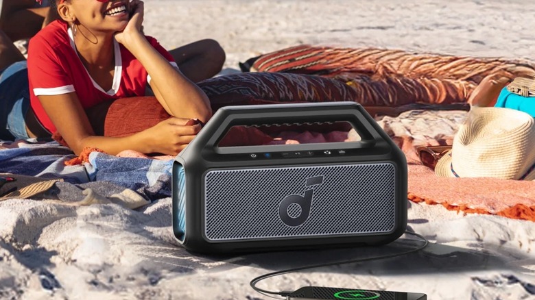 Anker's soundcore speaker on beach sand