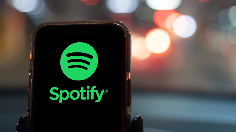 Spotify app on a smartphone in a car