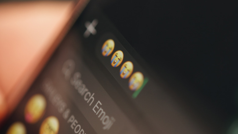 Emojis on in the messaging app on an iPhone screen