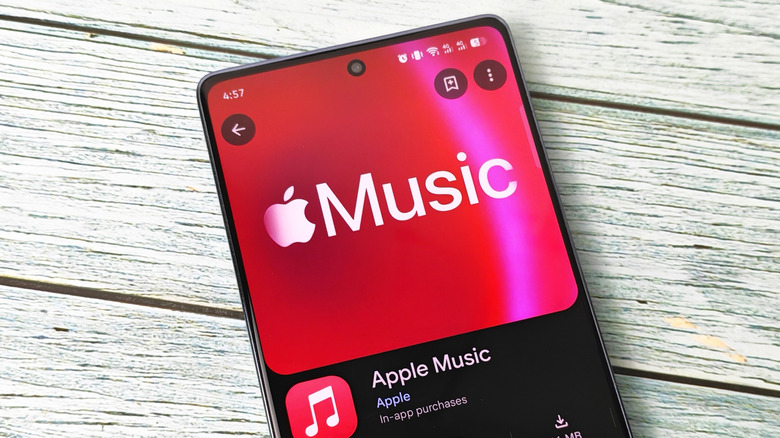 A cellphone displaying the Apple Music page within an App Store, likely the Google Play Store