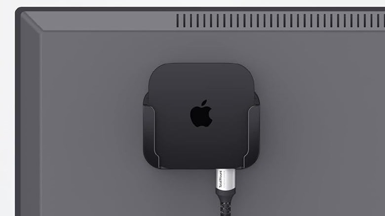 TotalMount Apple TV Mount adhered to back of TV