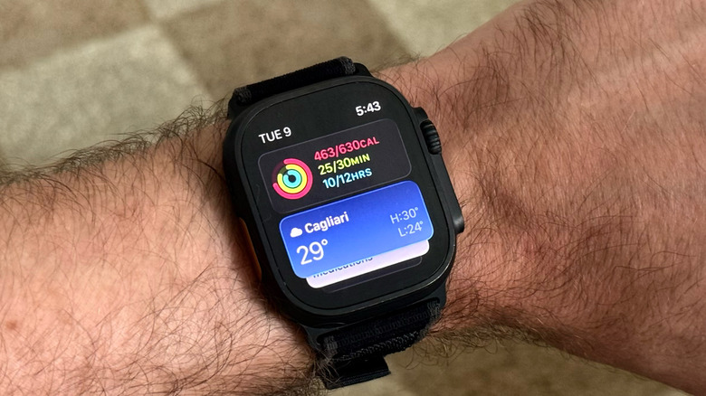 A man's wrist with an Apple Watch Ultra