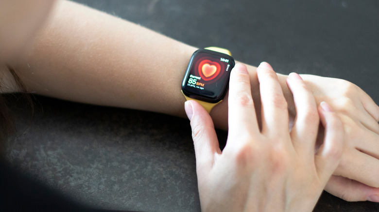 An Apple Watch Series 8 tracking the wearer's heart rate