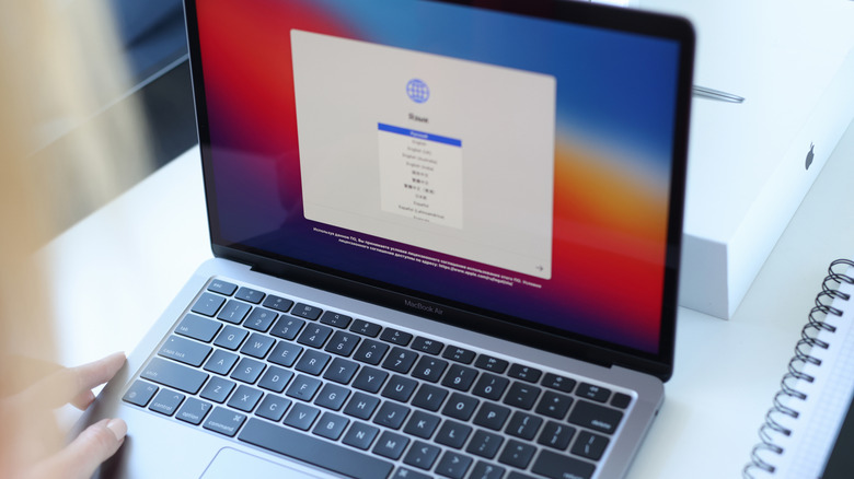 A Macbook Pro being opened