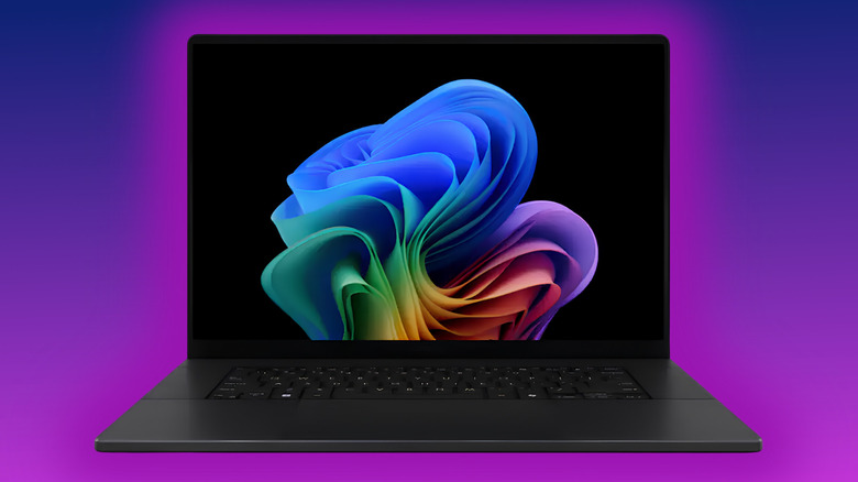 ASUS ProArt P16 surrounded by a purple glow on a purple gradient background