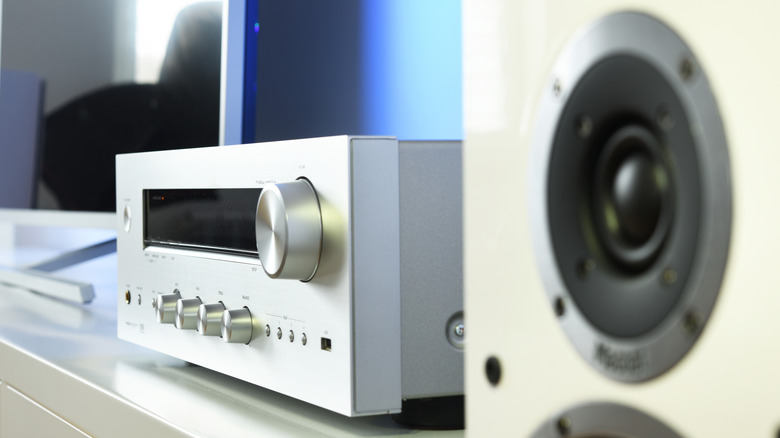 A silver stereo audio receiver on counter-top