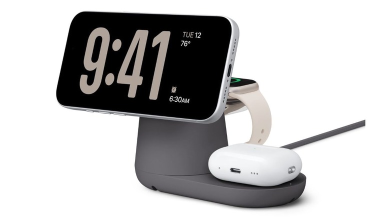 Belkin UltraCharge 3-in-1 charging stand powering an iPhone, Apple Watch, and AirPods.