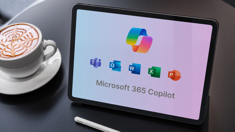 A tablet sitting on a table showing the Microsoft 365 Copilot logos