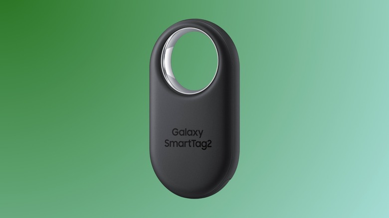 A black Samsung SmartTag 2 on a green gradient background