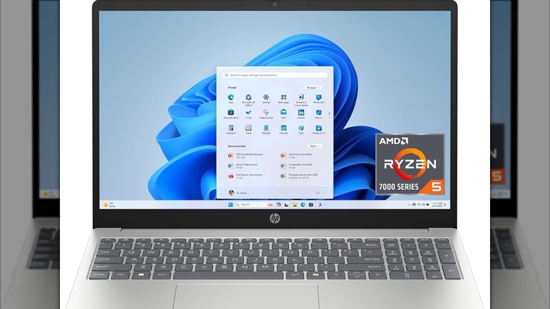 An open HP HD Touchscreen laptop.