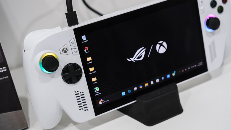 Asus ROG Xbox Ally on show floor displaying unit as its held in a dock