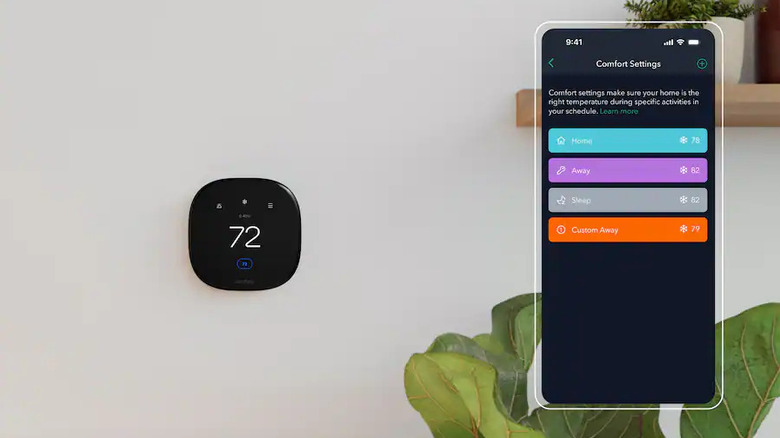 The Ecobee Enhanced Smart Thermostat set up in a modern home. A smartphone graphic is next to it, and the Tapo app is on its screen.
