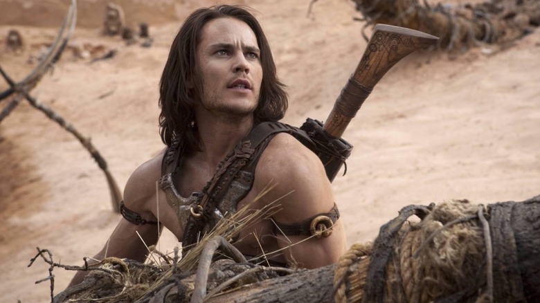 John Carter (Taylor Kitsch) looking up in John Carter