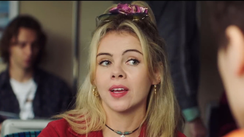 Erin Quinn talking in a classroom scene from Derry Girls.