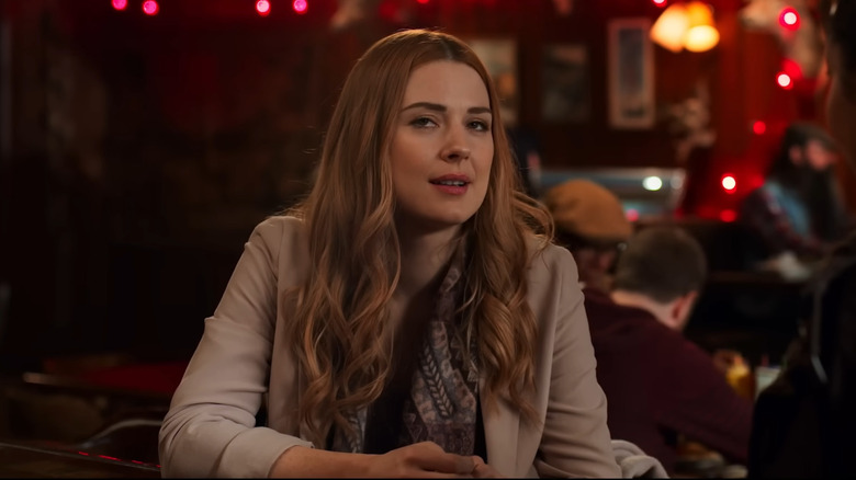 Mel Monroe in a conversation at Jack's Bar from Virgin River.