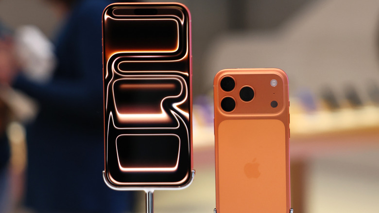 Front and back views of the iPhone 17 Pro Max on a presentation stand