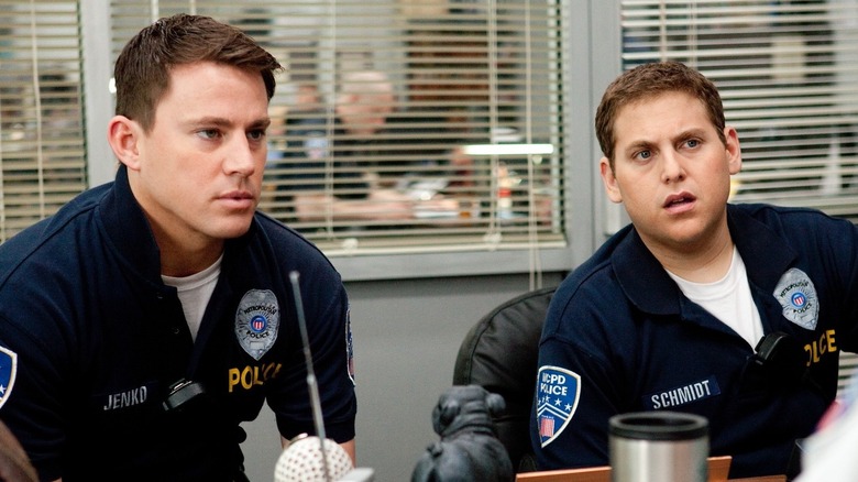 Jenko and Schmidt sat at a table in "21 Jump Street"