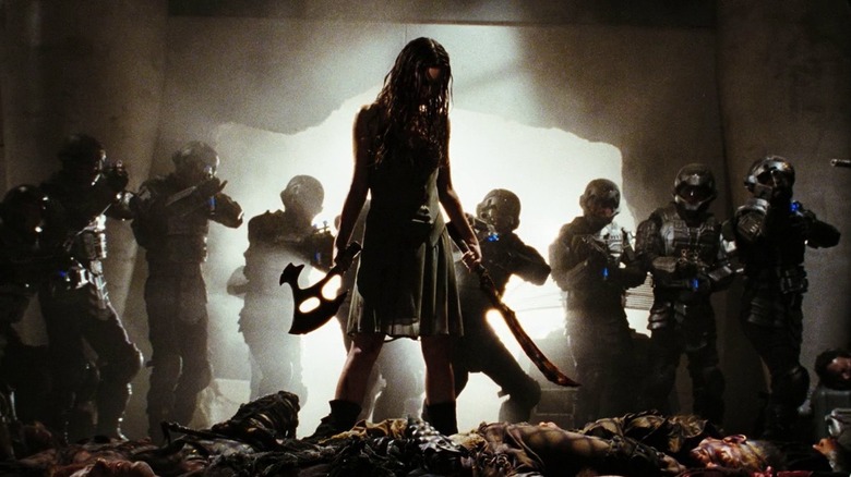 Summer Glau surrounded by soldiers in "Serenity" (2005)
