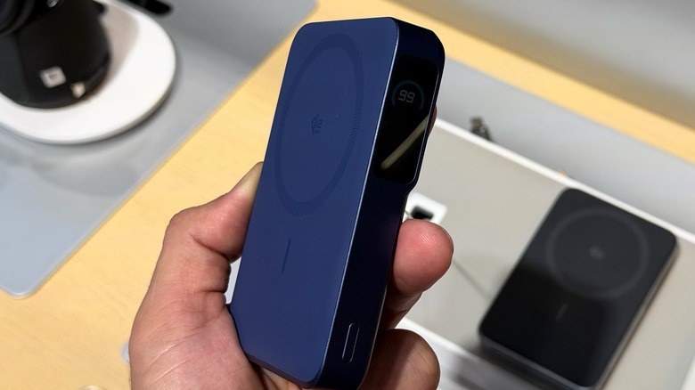 A hand holding Anker's latest Power Bank