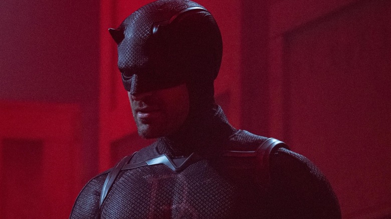 Daredevil in a red-lit warehouse in Daredevil