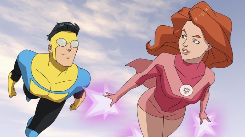 Invincible and Atom Eve flying in Invincible