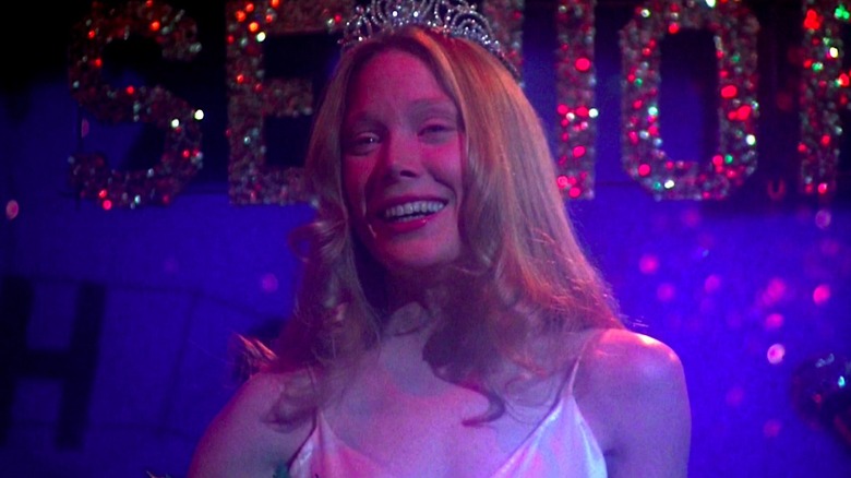 Carrie White (Sissy Spacek) smiling while attending prom in "Carrie."
