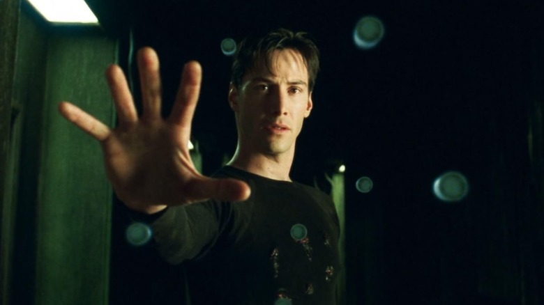Neo (Keanu Reeves) stopping bullets in The Matrix