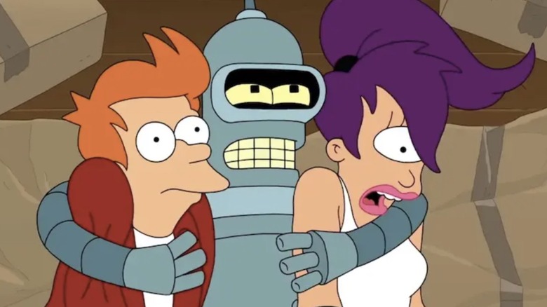 Bender hugging Fry and Leela in "Futurama."