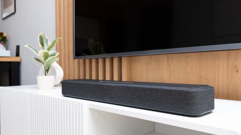 Soundbar placed on a TV console table