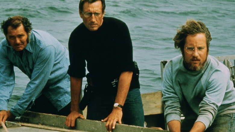 Richard Dreyfuss, Roy Scheider, and Robert Shaw on the Orca looking out to see in Jaws