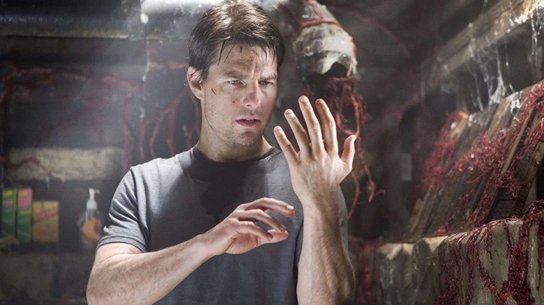 Tom Cruise looking at his hands in War of the Worlds