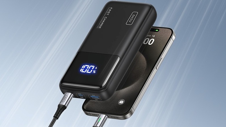 An INIU Power Bank charging an iPhone