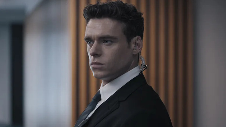 David (Richard Madden) standing in a hallway on "Bodyguard."