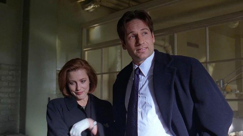 Scully and Mulder smiling