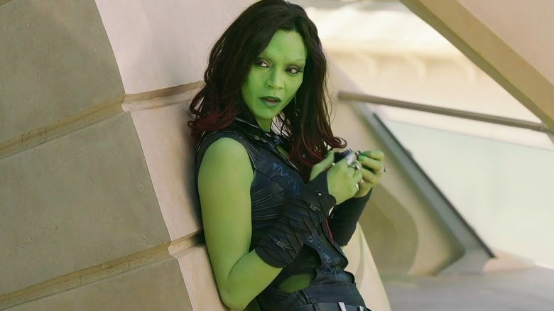 Gamora leaning against a pillar in "Guardians of the Galaxy."