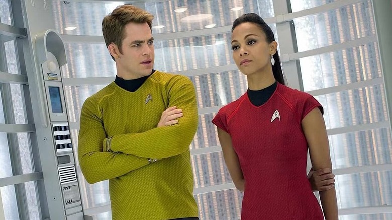 Captain Kirk and Uhura standing beside each other in "Star Trek Into Darkness."