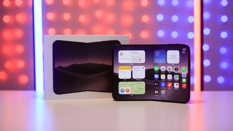 iPhone Duo on a table against some lights