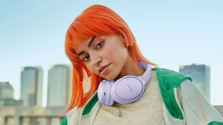 Woman wearing Bose headphones