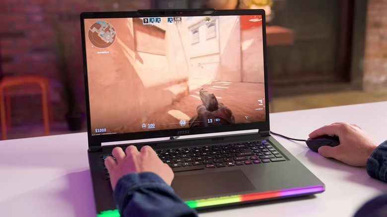 Person using an MSI gaming laptop