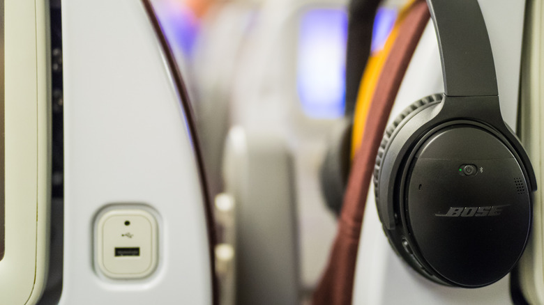 Noise cancellation headphones in the airplane
