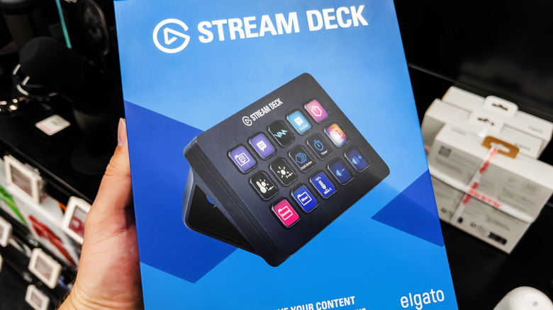 person holding Elgato stream deck box