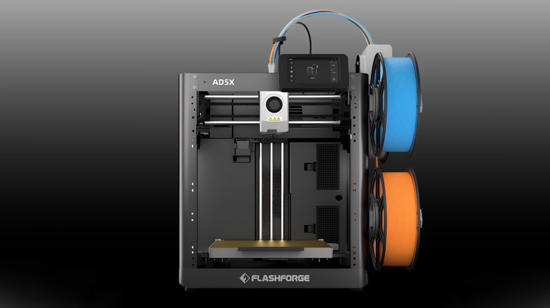 Flashforge AD5X front profile imagine on a black to white gradient background.
