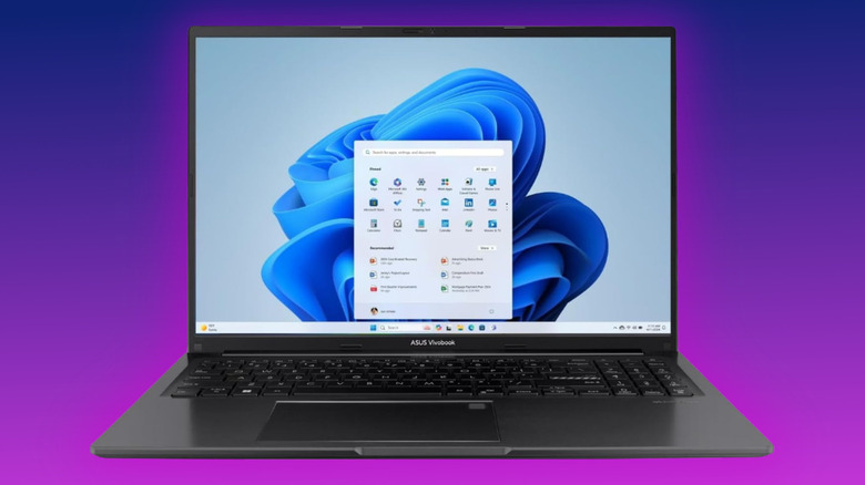 ASUS Vivobook 16 on a purple gradient background