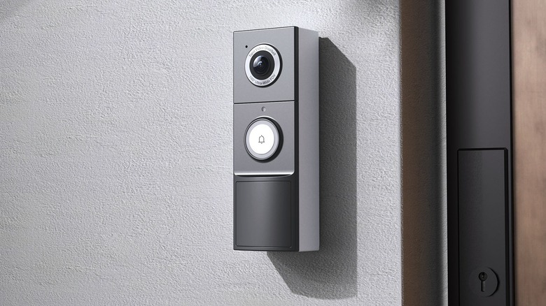 Tapo by TP-Link D225 Smart Video Doorbell Camera mounted outside a house